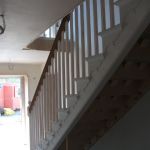 Softwood cut string and bracketed staircase